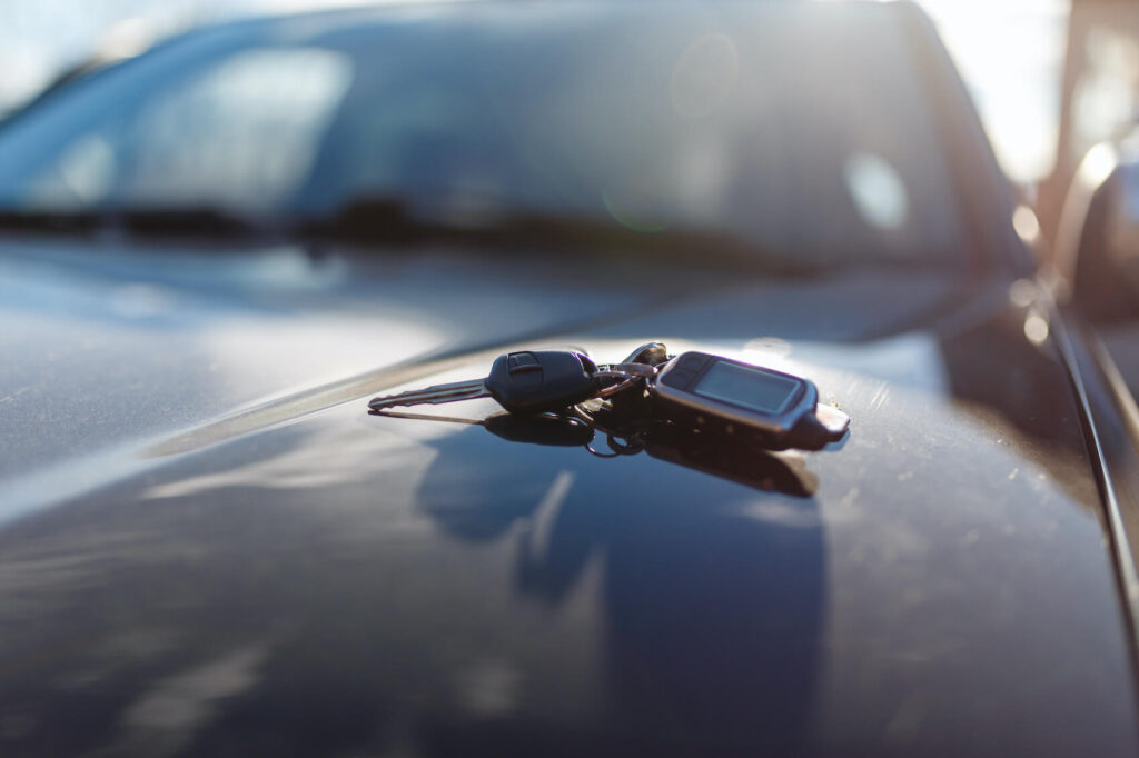 Car Keys on Hood of Car